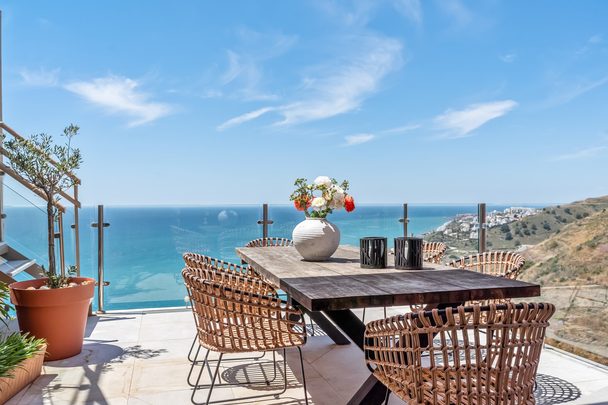 Terrace dining table overlooking the Mediterranean
